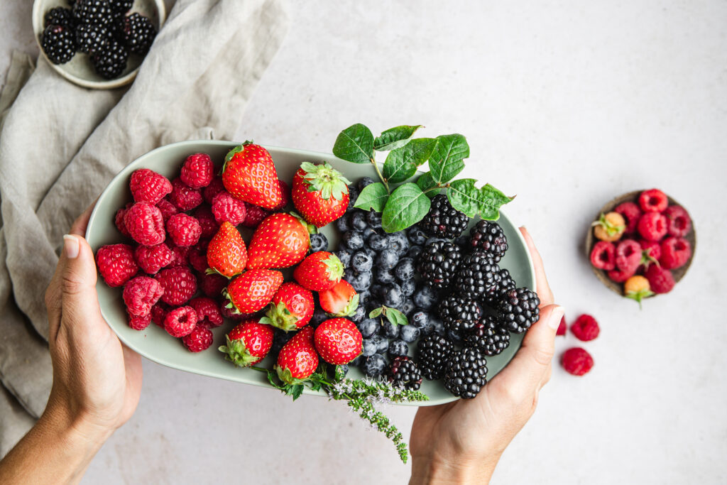 How does your skin build collagen? A bowl of fresh berries rich in vitamin C and antioxidants that help support healthy collagen production.