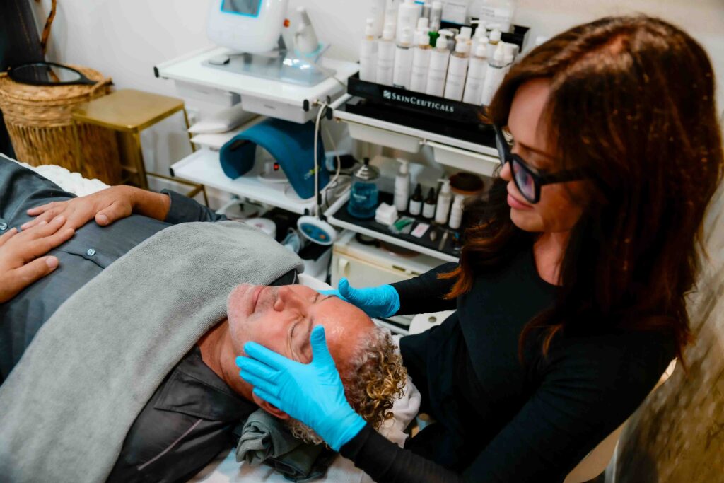 stacked acne treatment for men including microdermabrasion chemical peel extractions and LED therapy