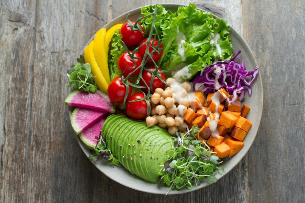 "Fiber-rich foods including vegetables, fruits, legumes, and seeds that fuel a healthy gut microbiome and support clearer skin"